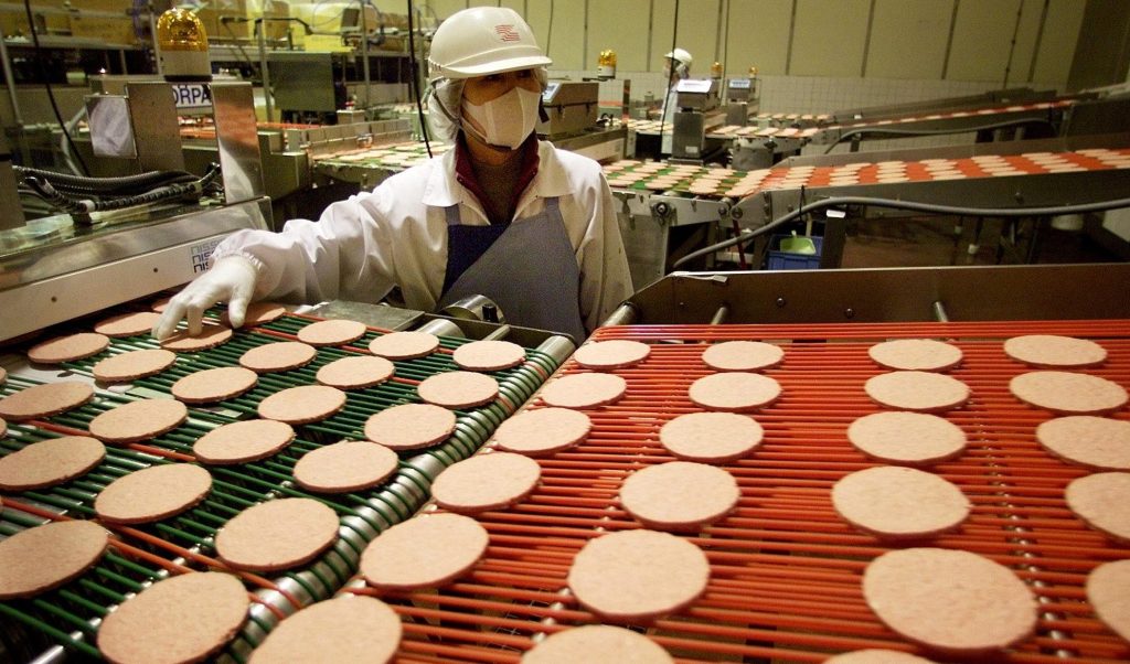 Uniform hamburger patties on the production line at a McDonald's plant in Tokyo. Photo: AP/Itsuo Inouye