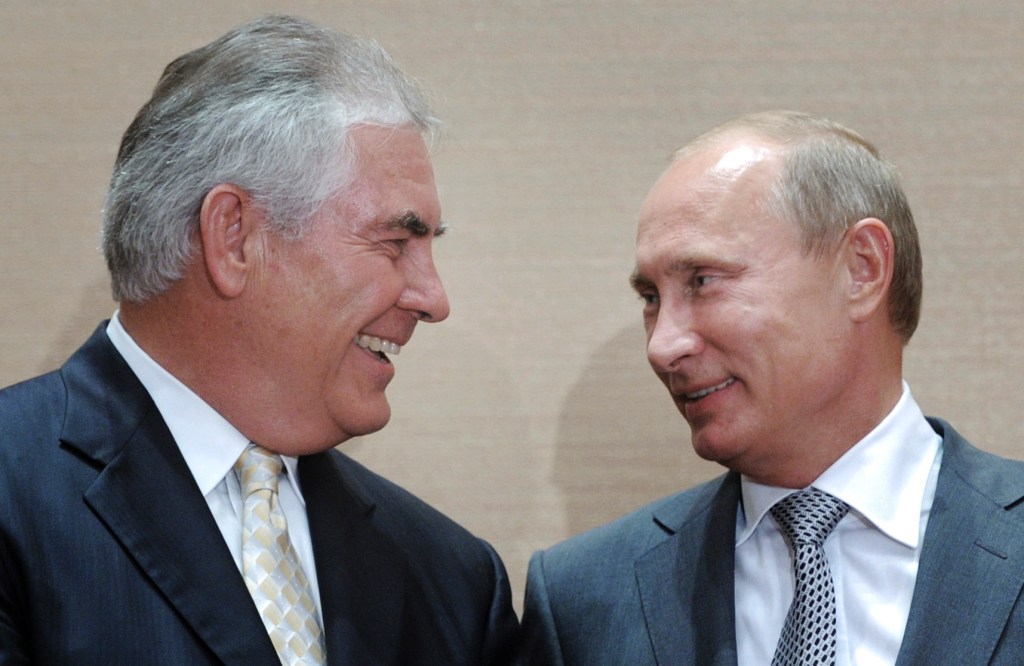Russian Prime Minister Vladimir Putin (right) with Rex Tillerson in Sochi, Russia, in 2011. Photo: AP/RIA Novosti/Alexei Druzhinin