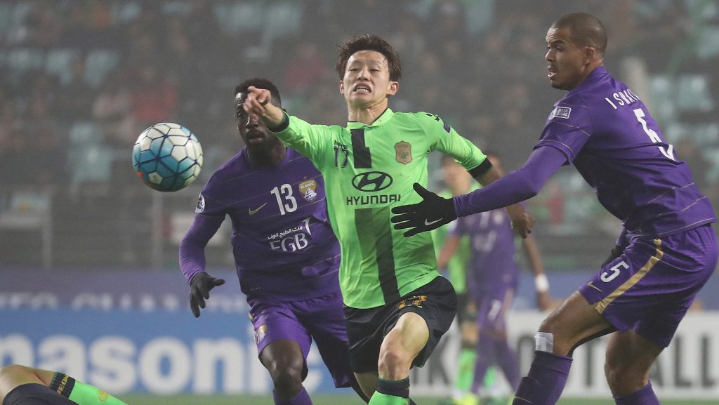 Jeonbuk Hyundai Motors player Lee Jae-sung fights for the ball during the first leg of the Asian Champions League final in South Korea last month. Adelaide United will have to contend with the champions. Photo: Choe Young-soo / Yonhap via AP