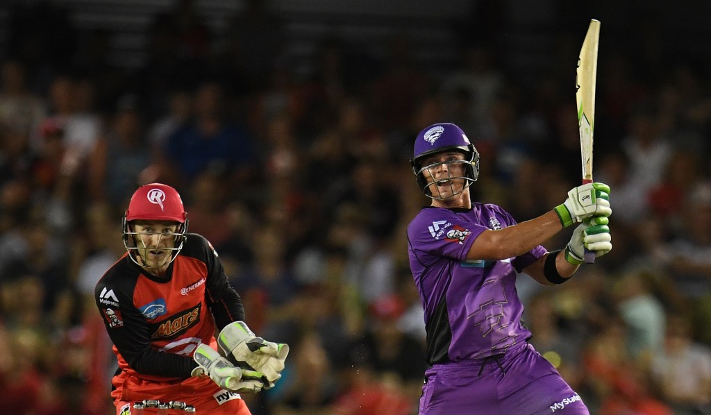 Ben McDermott storms to 114 as Peter Nevill of the Renegades looks on. Photo: Julian Smith / AAP