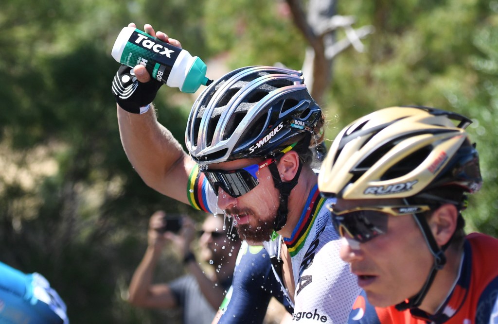 World Champion Peter Sagan cools himself down during stage one of the Tour Down Under. Photo: Dan Peled / AAP