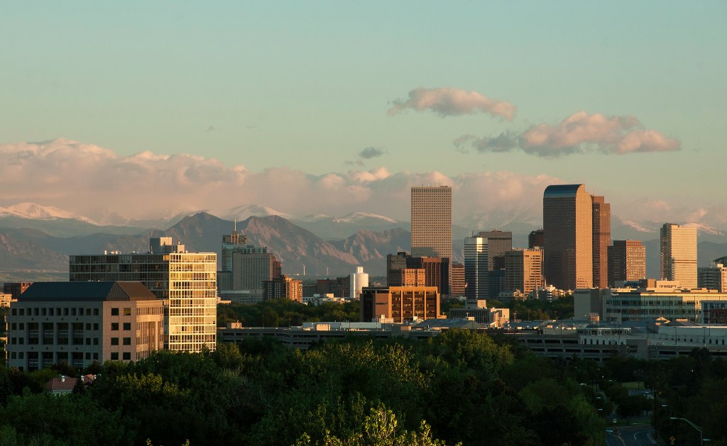 The sun rises over Denver, Colorado. Photo: Sheila Sund/Flickr - https://creativecommons.org/licenses/by/2.0/