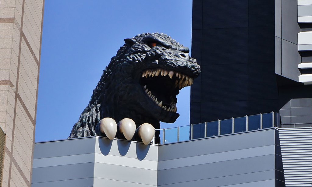 Godzilla emerges from the Toho Cinema building. Photo: Manish Prabhune / flickr