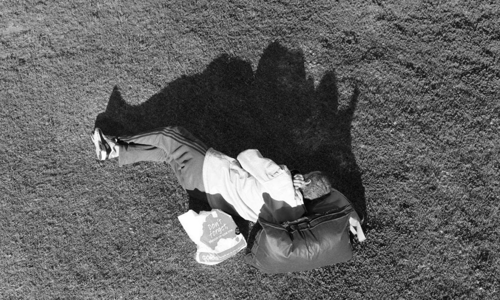 A man sleeps rough under the Adelaide Festival Centre bridge. Photo: Tony Lewis / InDaily