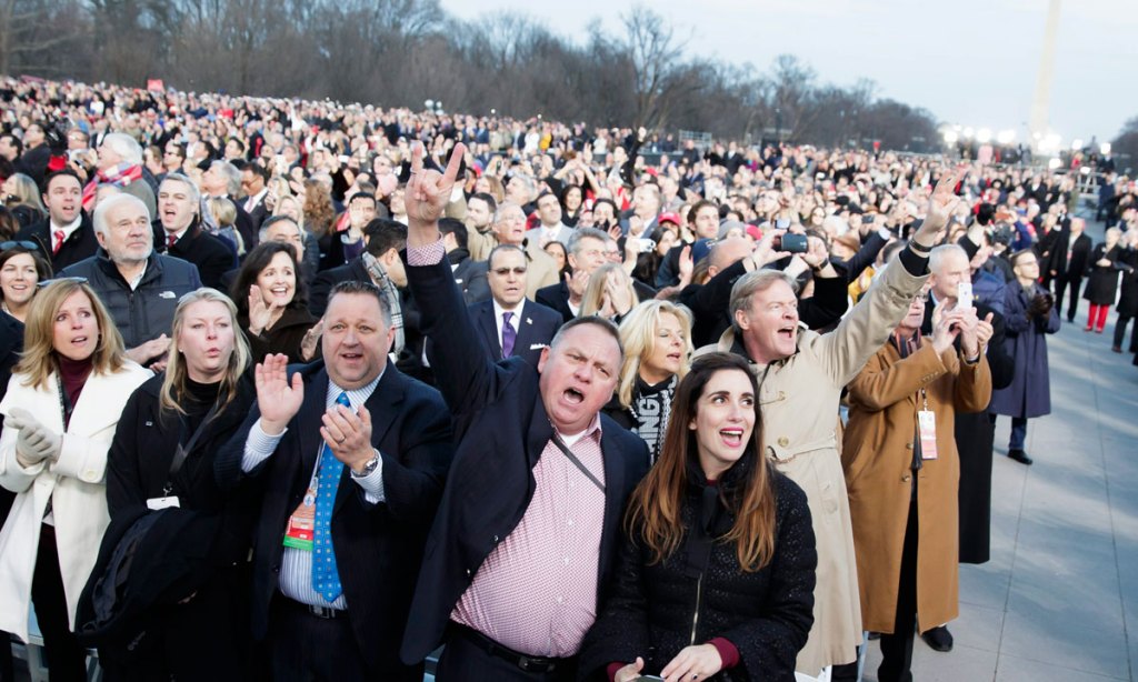 Audience members sing during the 'Make America Great Again! Welcome Celebration' for Donald Trump on a stage at the Lincoln Memorial on the eve of his inauguration. Photo: EPA