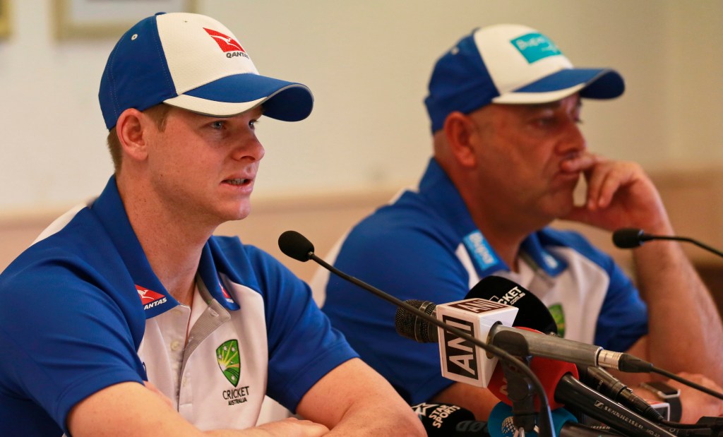 Steve Smith and coach Darren Lehmann speak to reporters in Mumbai, India. Photo: Rafiq Maqbool / AP