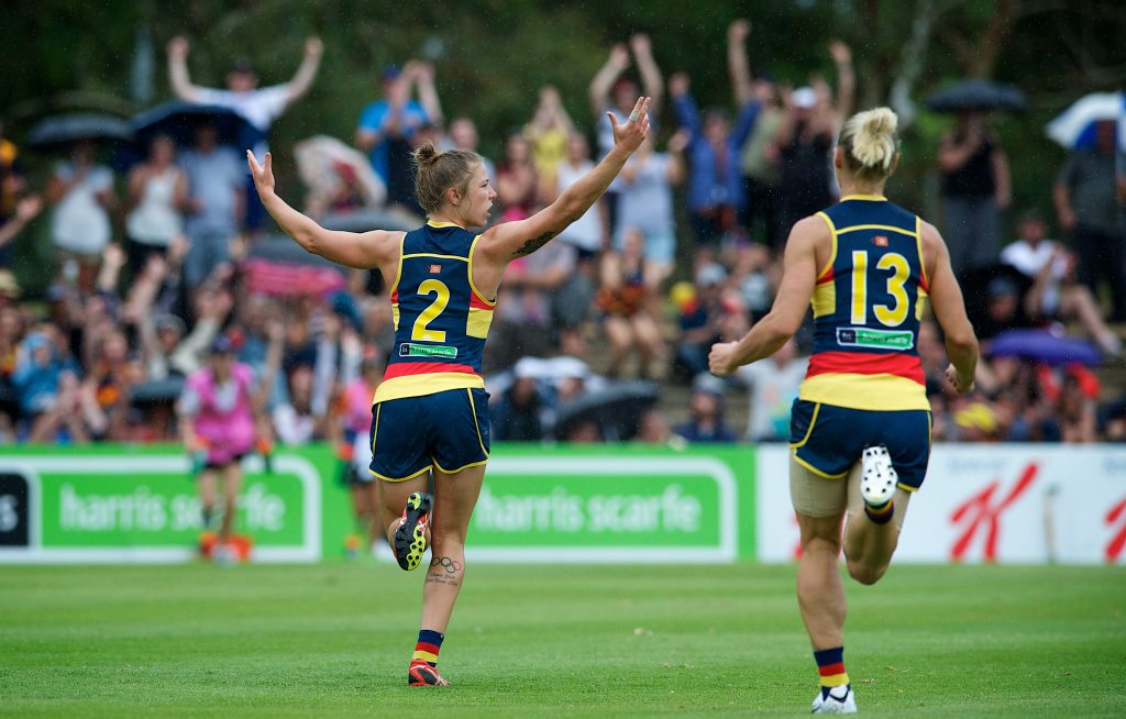 Kellie Gibson and Erin Phillips enjoy the moment as the Crows get their first goal in AFLW football. Photo: Michael Errey / InDaily