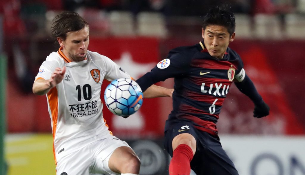 Brisbane's Brett Holman tries to keep possession as the Roar lose 3-0. Photo: Yomiuri Shimbun / AP