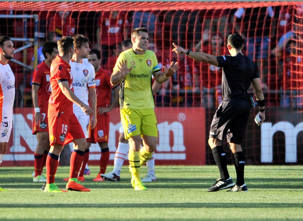 Michael Theo of Brisbane Roar is sent off during last night's spiteful encounter. Photo: David Mariuz / AAP