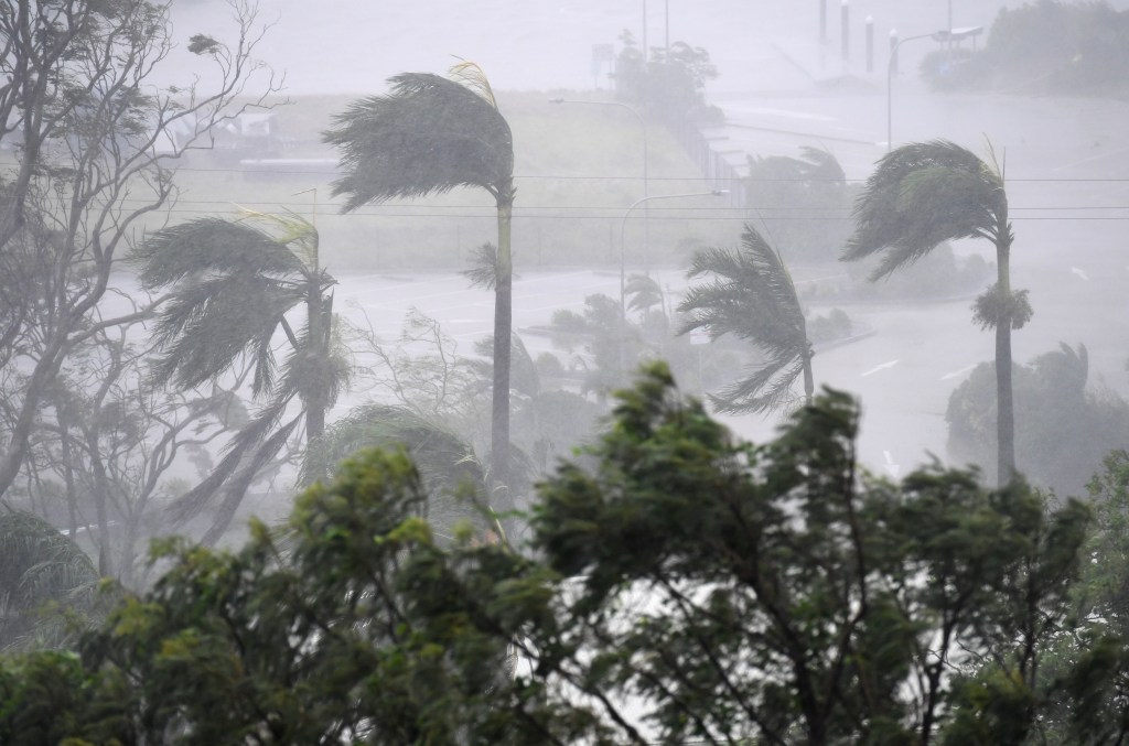 Strong winds and rain lash Airlie Beach today. Photo: AAP/Dan Peled