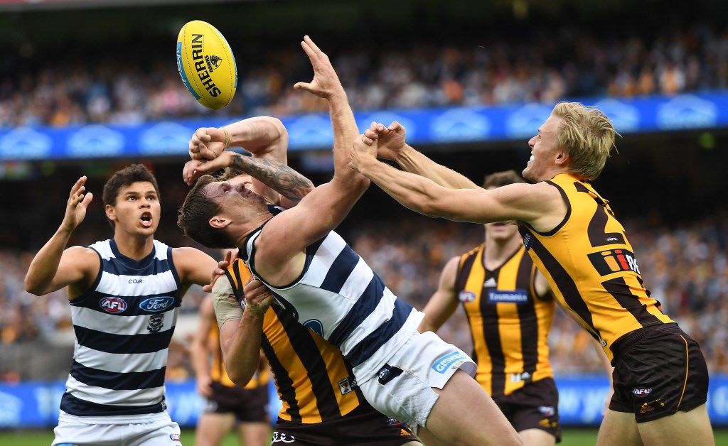 Geelong's Patrick Dangerfield (third from left) in the thick of the action at the MCG yesterday. Photo: AAP/Julian Smith