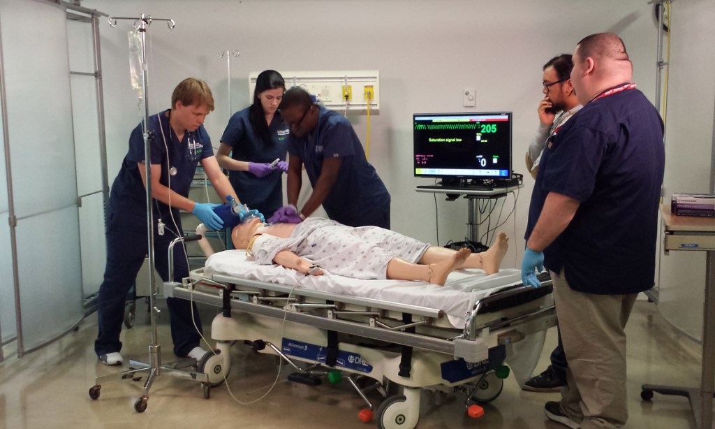 A team of medical staff in a US hospital, being assessed using the Learning Experience Builder software while treating a mock patient having a heart attack. Image: supplied.