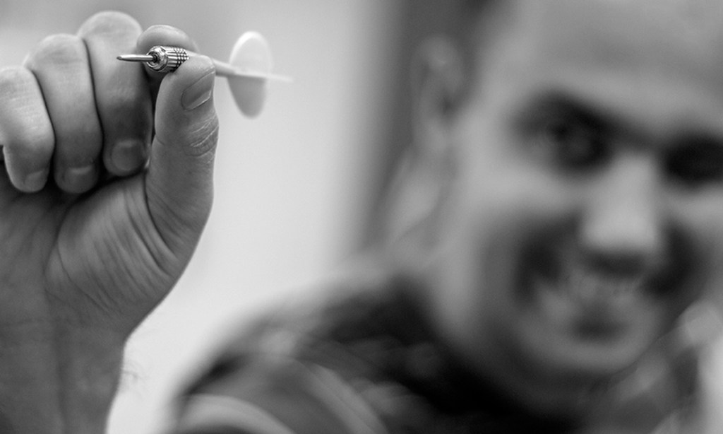 Will he or won’t he hit the bullseye? Using Bayes’ Theorem, your prediction will be based on how the current match is going - and how he’s played in the past. Flickr/Marjan Lazarevski, CC BY-ND
