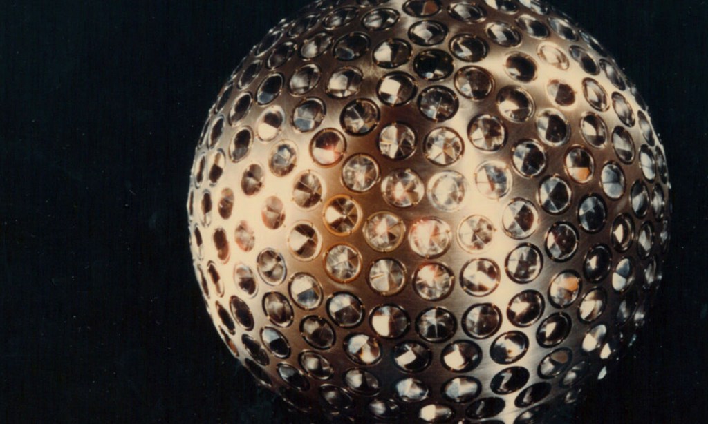 A scale model of one of the two LAGEOS satellites. NASA's Goddard Space Flight Center