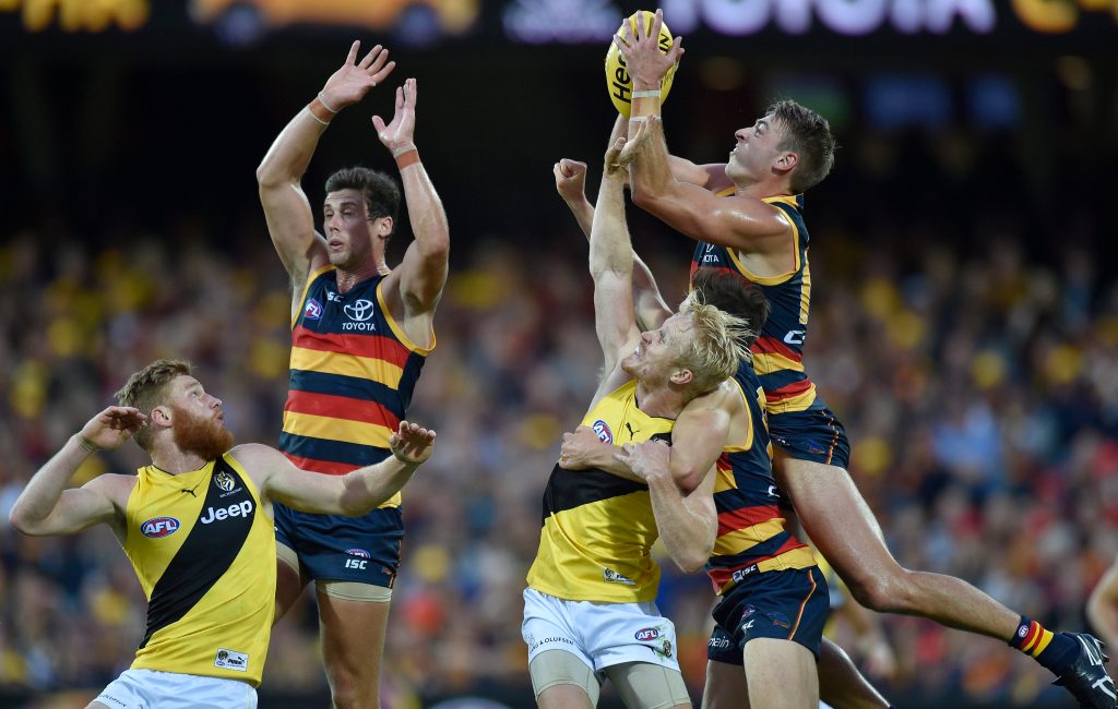 Crow Daniel Talia takes a strong mark during yesterday's thrashing of the Tigers. Photo: AAP/David Mariuz