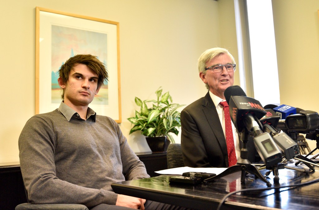 Lawyer Stephen Kenny (right) and Cassandra Sainsbury's fiance Scott Broadbridge at a press conference in Adelaide today. Photo: AAP/David Mariuz