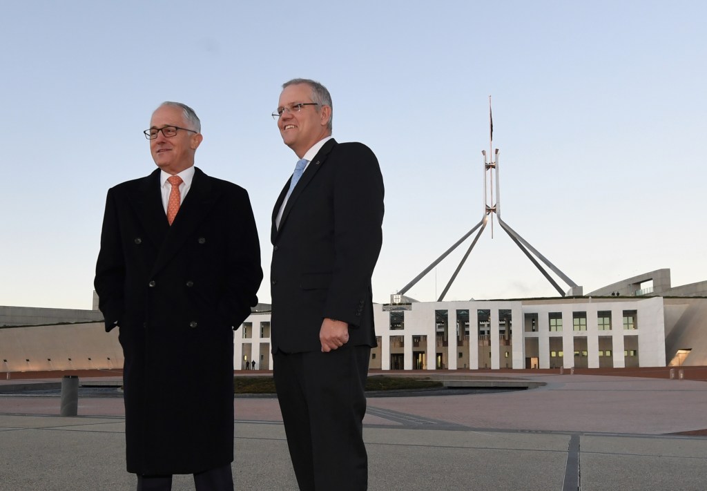 Prime Minister Malcolm Turnbull (left) and Treasurer Scott Morrison selling the budget outside Parliament House. Photo: AAP/Lukas Coch