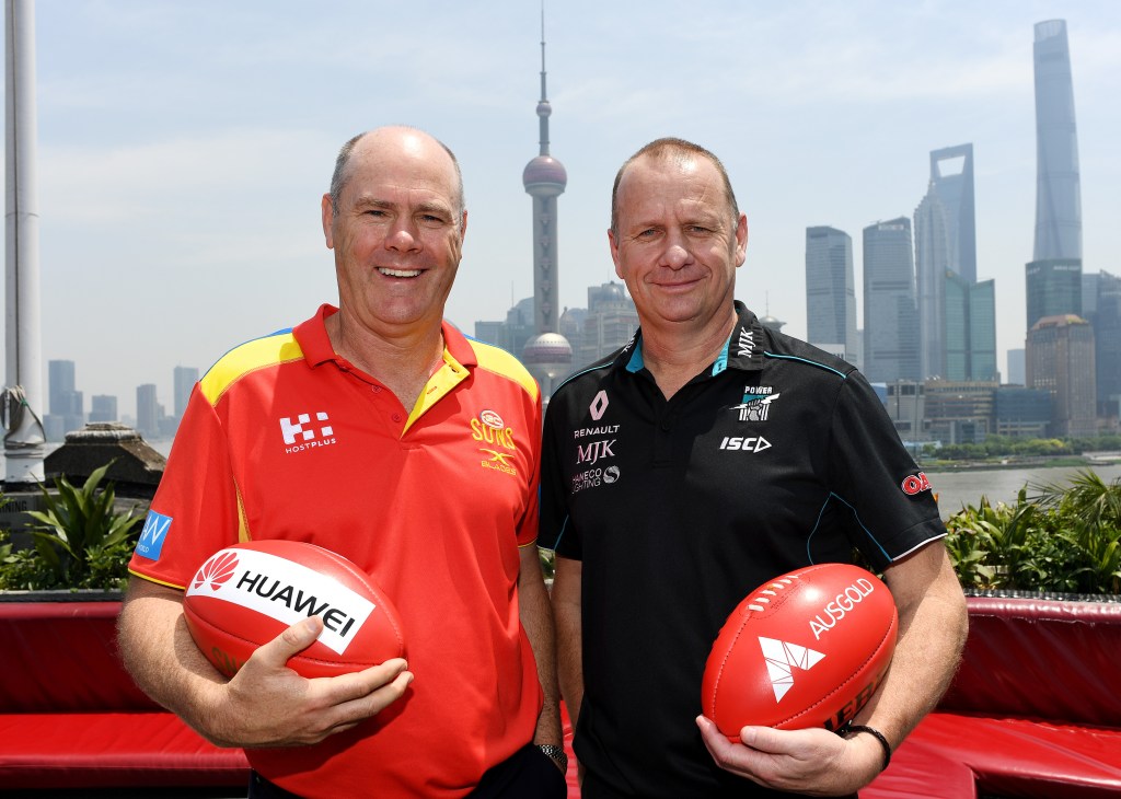 Suns coach Rodney Eade and Power coach Ken Hinkley at a Bar Rouge media call in Shanghai. Photo: Tracey Nearmy / AAP