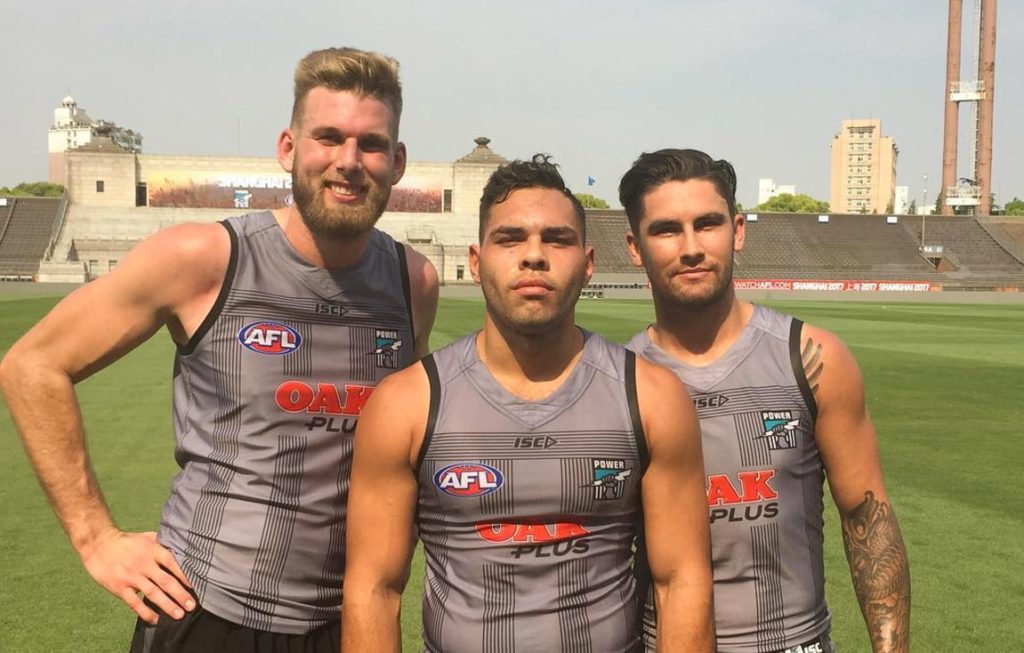Port Adelaide's Jackson Trengove, Jarman Impey and Chad Wingard in Shanghai. Photo via Instagram