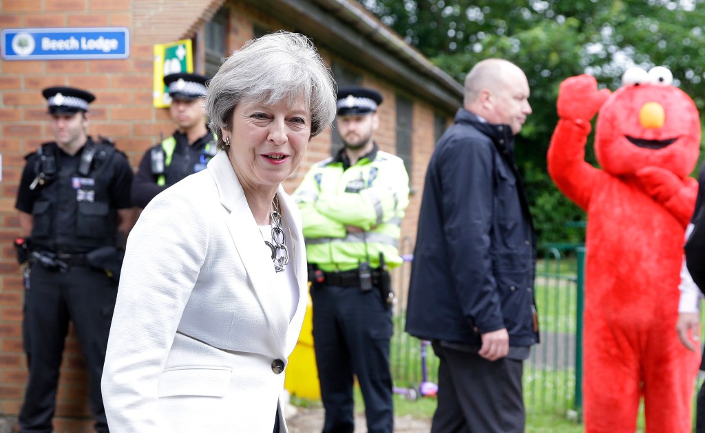 Britain's Prime Minister Theresa May leaves a polling station after voting in the general election. Photo: AP/Alastair Grant