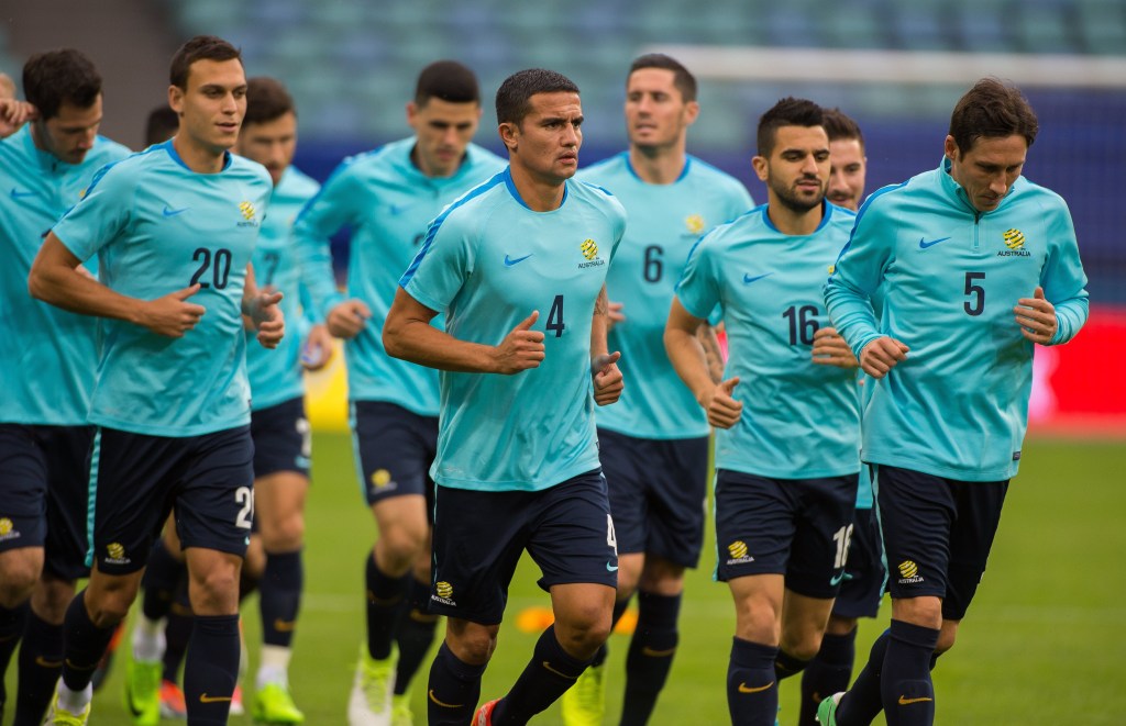 Tim Cahill leads his teammates during a training session ahead of tonight's Confederations Cup group match with Germany in Russia. Photo: PETER POWELL / EPA