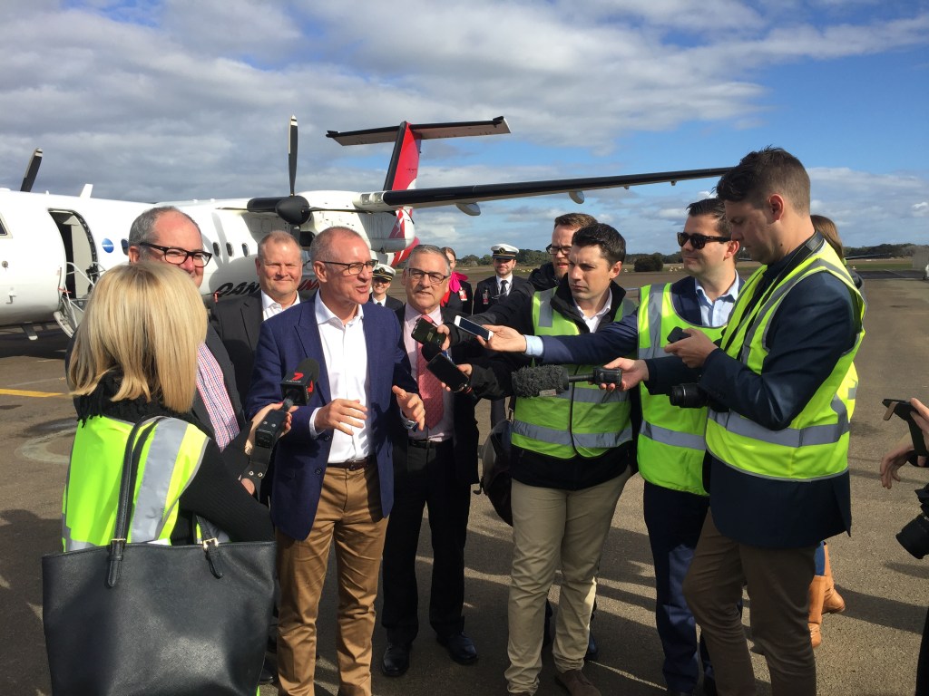 Jay Weatherill fronts reporters on the tarmac at Kingscote.