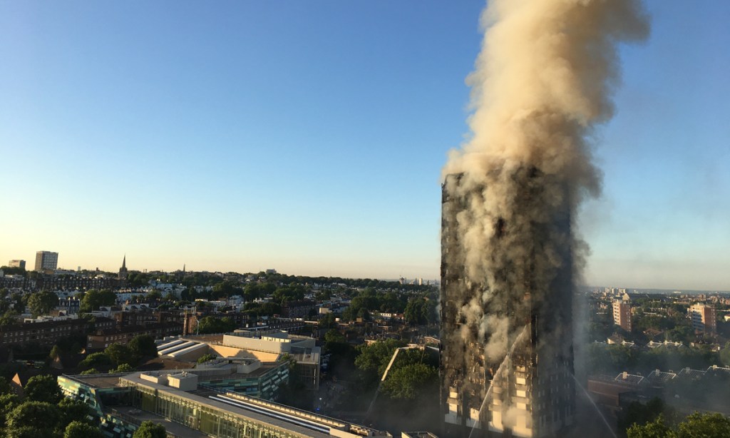 Smoke pours from the Grenfell Tower fire, in which at least 17 people have died. Photo: PA
