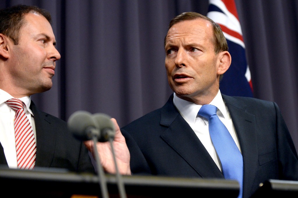 Josh Frydenberg (left) with Tony Abbott during the latter's Prime Ministership in 2014. Photo: AAP/Alan Porritt