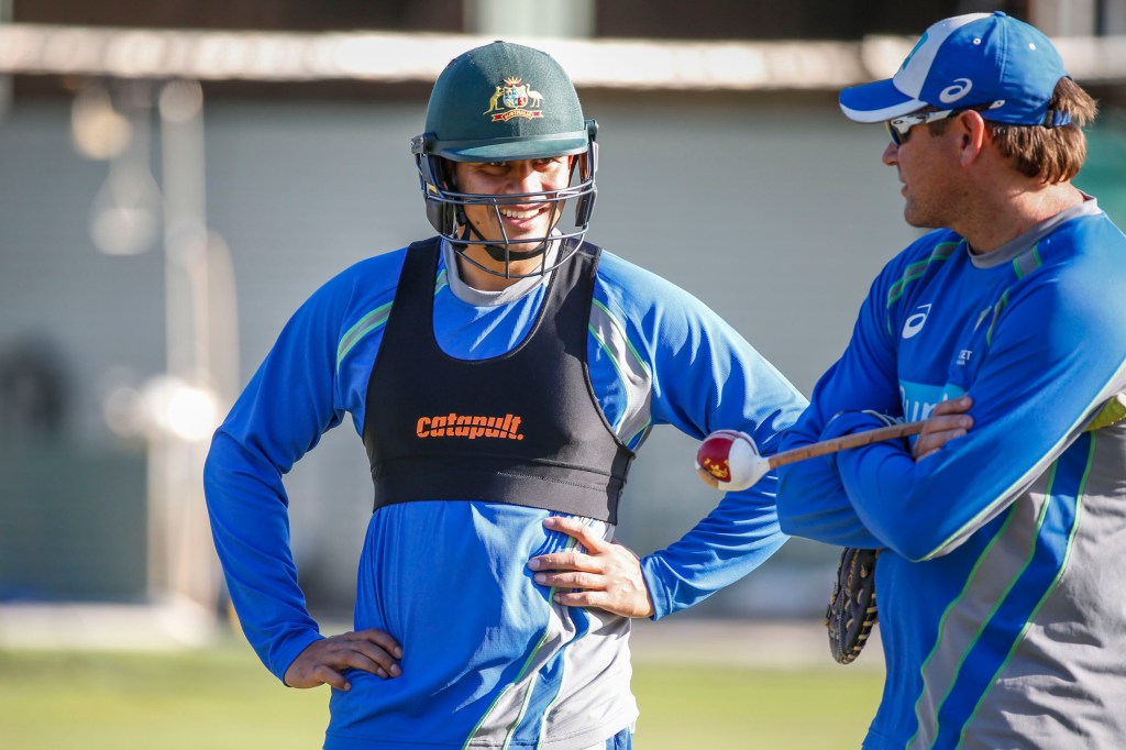 Usman Khawaja and Ryan Harris at an Australia A training session in Brisbane yesterday. Photo: Glenn Hunt / AAP
