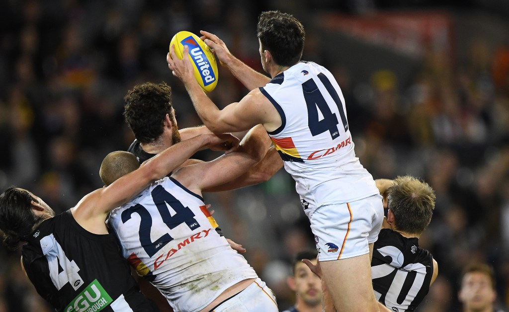 Mitch McGovern takes what is colloquially known as "a fair grab". Photo: Julian Smith / AAP