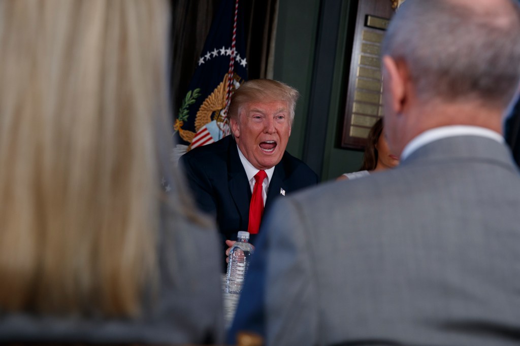 President Donald Trump talks tough about North Korea at Trump National Golf Club in Bedminster, New Jersey. Photo: AP/Evan Vucci