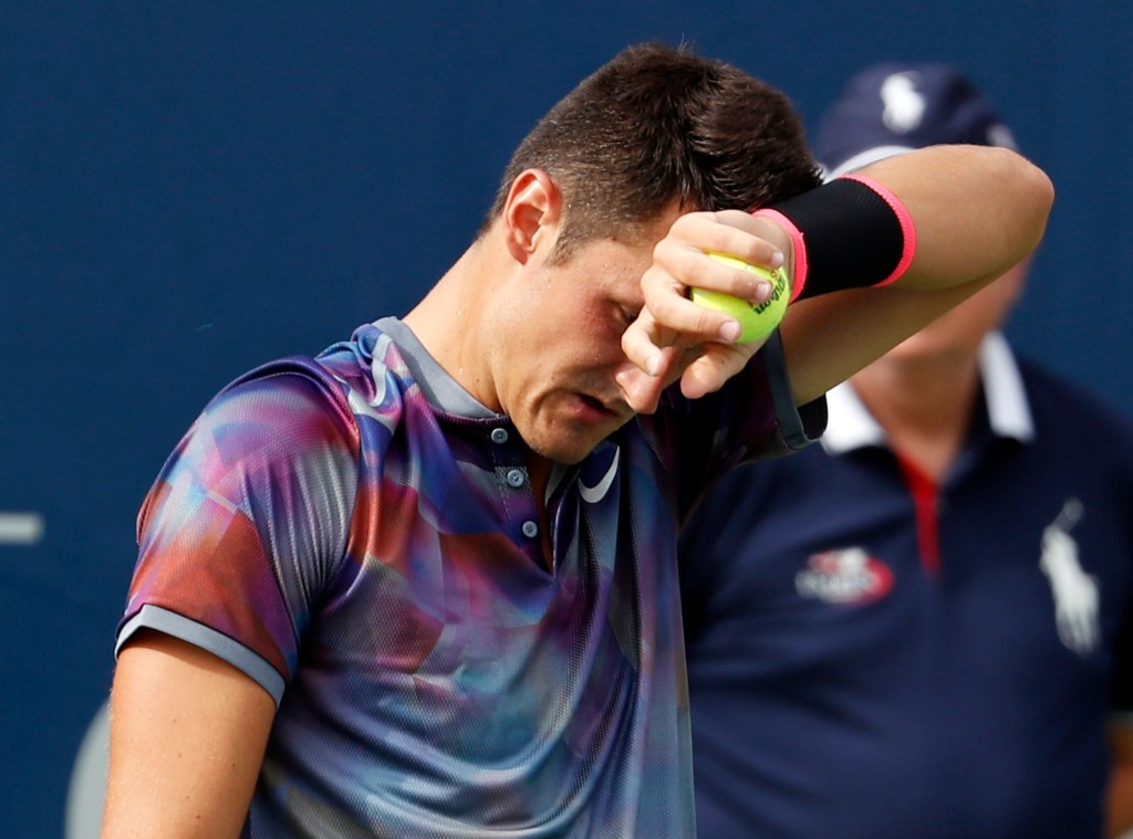 Bernard Tomic serving to Gilles Muller during his first-round US Open loss last month. Photo: Michael Noble / AAP