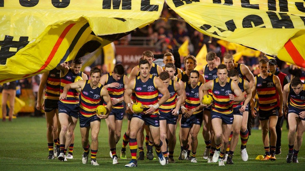 Tex didn't do a great deal on the night, but he definitely nailed the 'Menacing Game Face While Running Through The Banner'. Photo: Michael Errey / InDaily