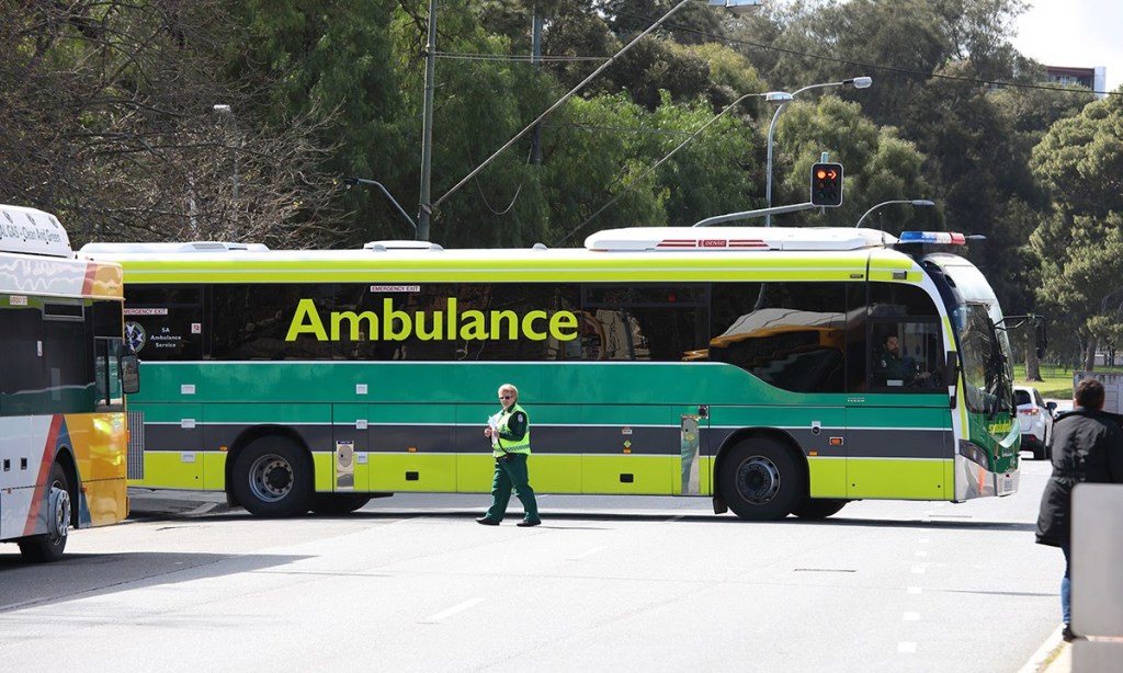 SA's "Ambus" ferries patients from the old to the new Royal Adelaide Hospital today. The ambulance workers' union says it's close to negotiating an exemption to the Government's Return To Work provisions. Photo: Tony Lewis / InDaily
