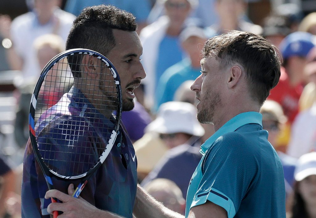 Nick Kyrgios and John Millman share a word after their US Open match. Photo: Peter Foley / EPA 