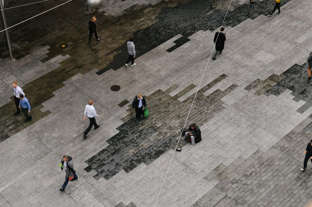 A rainy day in the city. David can't afford to turn on his heater. File image: AAP/Morgan Sette
