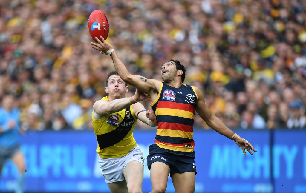 Eddie Betts juggles in front of Dylan Grimes during the 2017 Grand Final. Richmond and the Crows have dominated the AFL's prime-time fixtures in the 2018 draw. Photo: Julian Smith / AAP