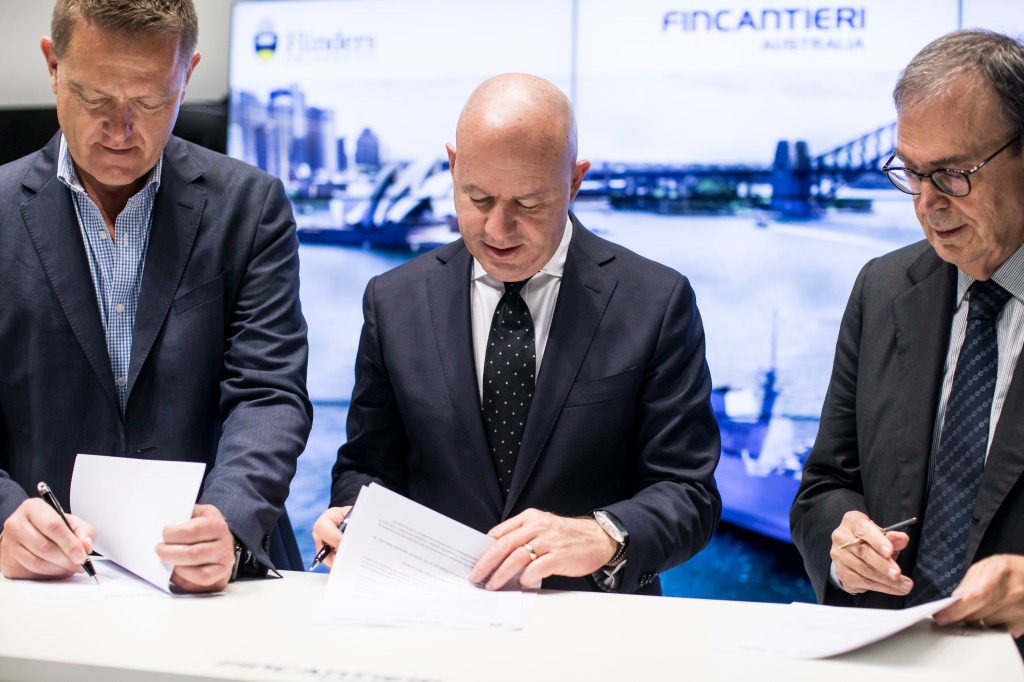 Flinders University Vice-Chancellor Professor Colin Stirling, Fincantieri Australia Chairman Dario Deste and CETENA President Sandro Scarrone seal the deal at the International Maritime Expo, Pacific 2017. Photo courtesy Fincantieri