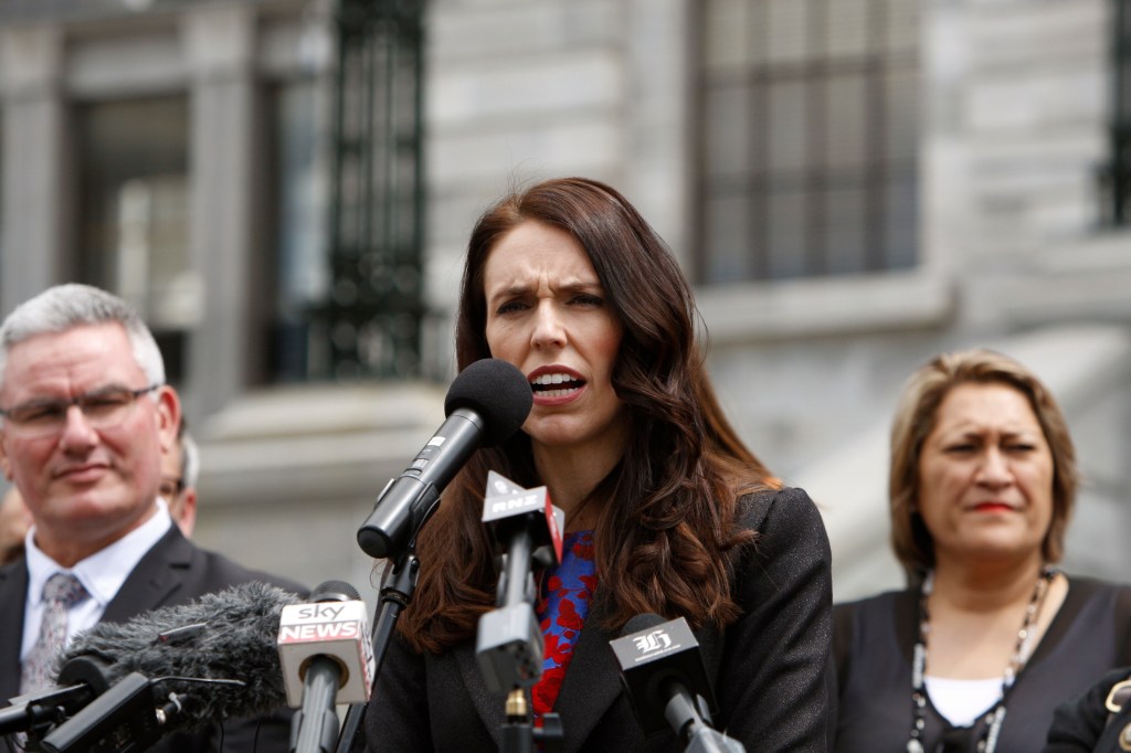 New Zealand Prime Minister Jacinda Ardern (centre) will raise the Manus Island situation with Malcolm Turnbull on Sunday.  Photo: AP/Nick Perry