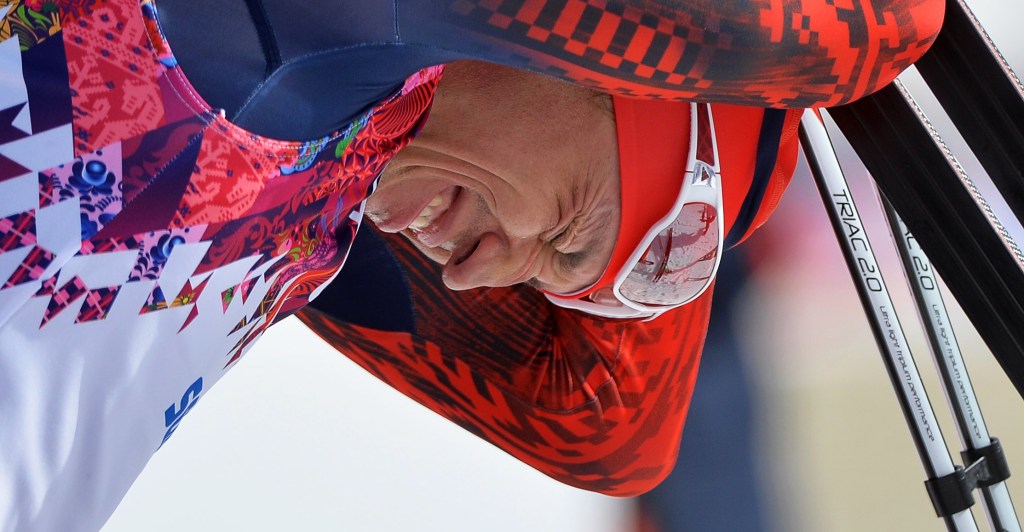 Alexander Legkov reacts in the finish area after the men's 50km Mass Start Freestyle Cross Country Skiing race at the Sochi 2014 Olympic Games. He has now been banned from the Olympics for life. Photo: Hendrik Schmidt / EPA 