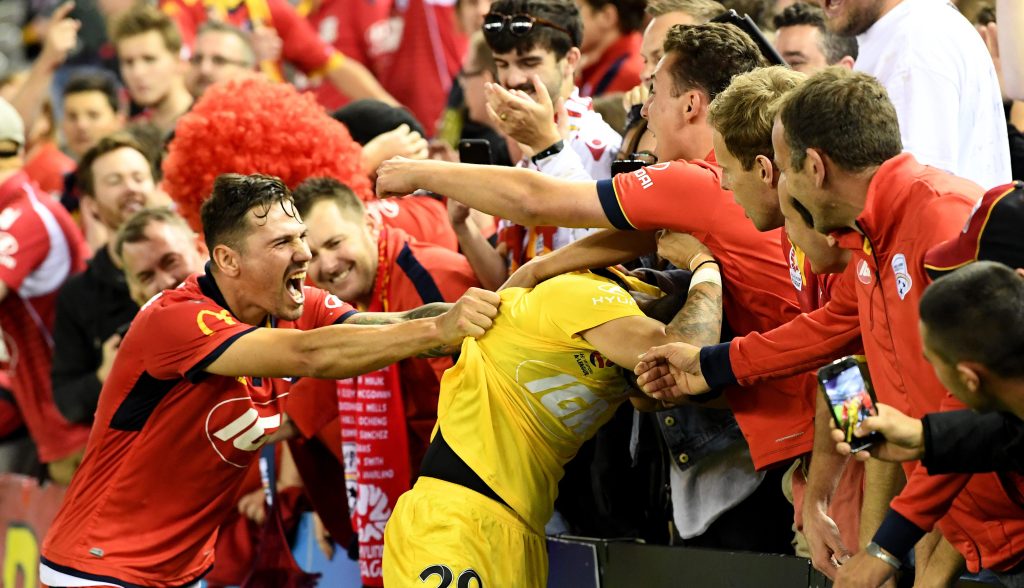 Celebrations after Friday night's epic win. Photo: Joe Castro / AAP
