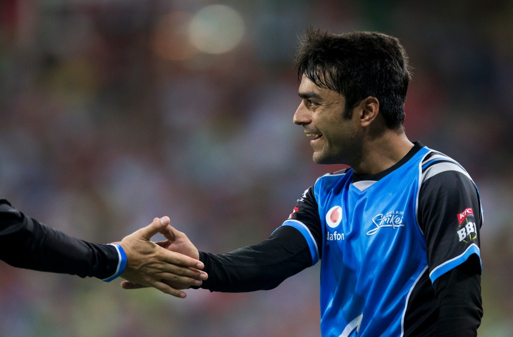 Rashid Khan capped off his night with a catch to end Chris Green's innings. Photo: Craig Golding / AAP
