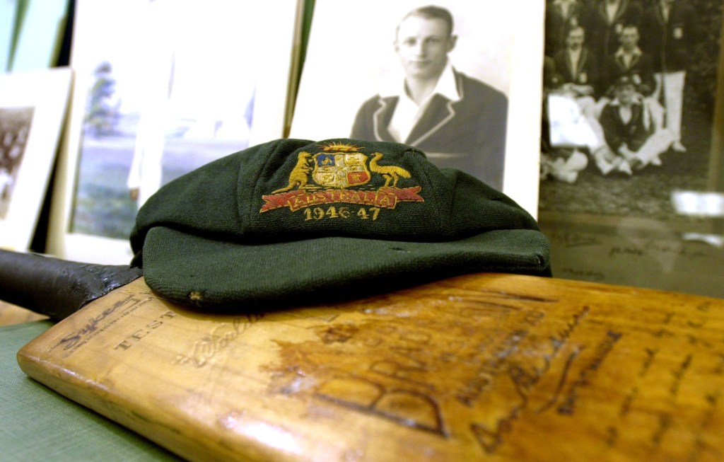 The baggy green tradition is not just macho chest-beating - it's also the tradition of Bradman and Simpson and Benaud. Photo: AP/Richard Lewis