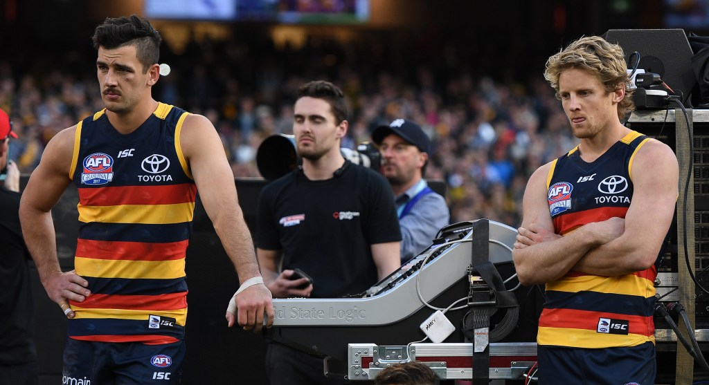 Taylor Walker (left) with teammate Rory Sloane of  after losing the AFL grand final. Photo: AAP/Julian Smith