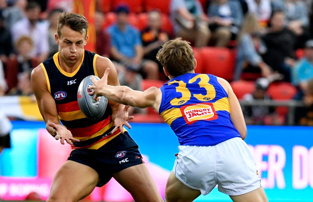 Tom Doedee (left) will make his AFL debut tonight. Photo: AAP/Sam Wundke