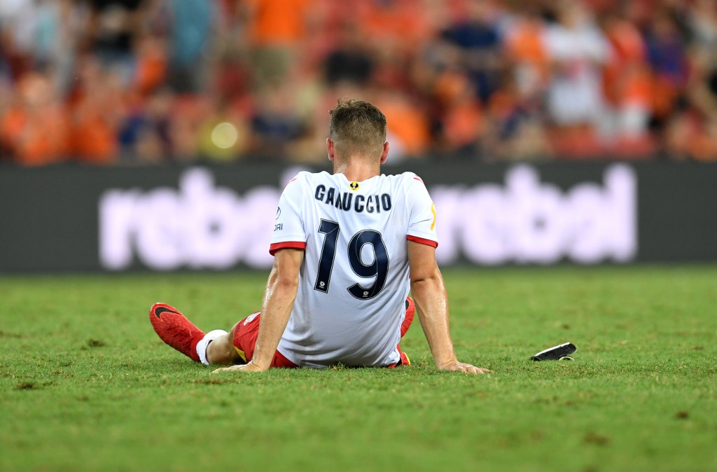 United's Benjamin Garuccio reacts with disappointment after Adelaide's loss to the Roar. Photo: AAP/Dan Peled