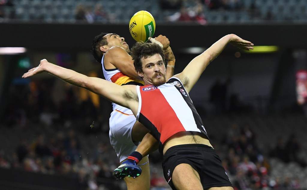 Dylan Roberton practices his Jesus Christ Pose as Eddie Betts returns to his own Messianic ways. Photo: Julian Smith / AAP