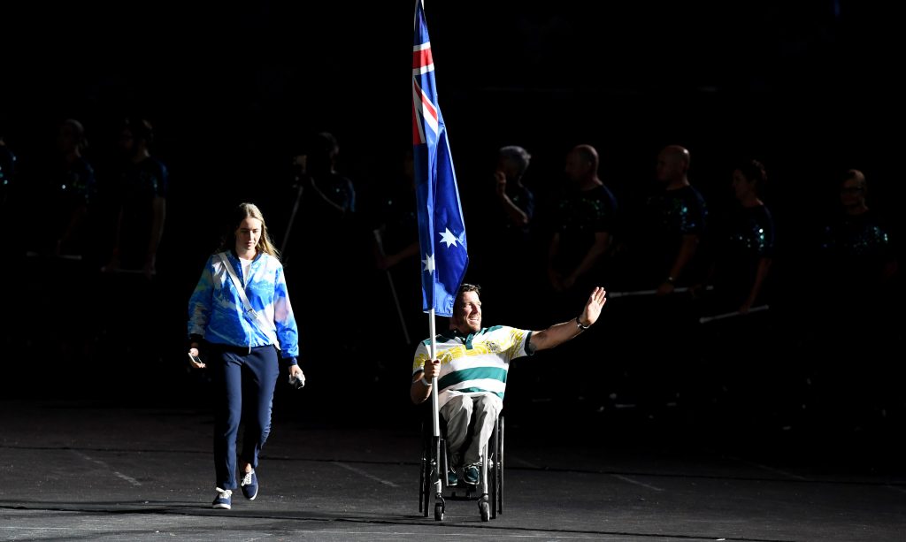 TV viewers missed this moment: Australian flagbearer Kurt Fearnley enters the stadium before the start of the closing ceremony. Photo: AAP/Dan Peled