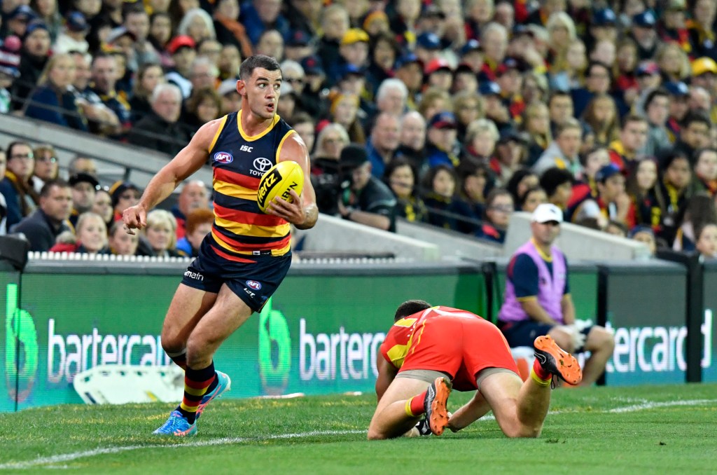 Taylor Walker before he left the field on Saturday. AAP image