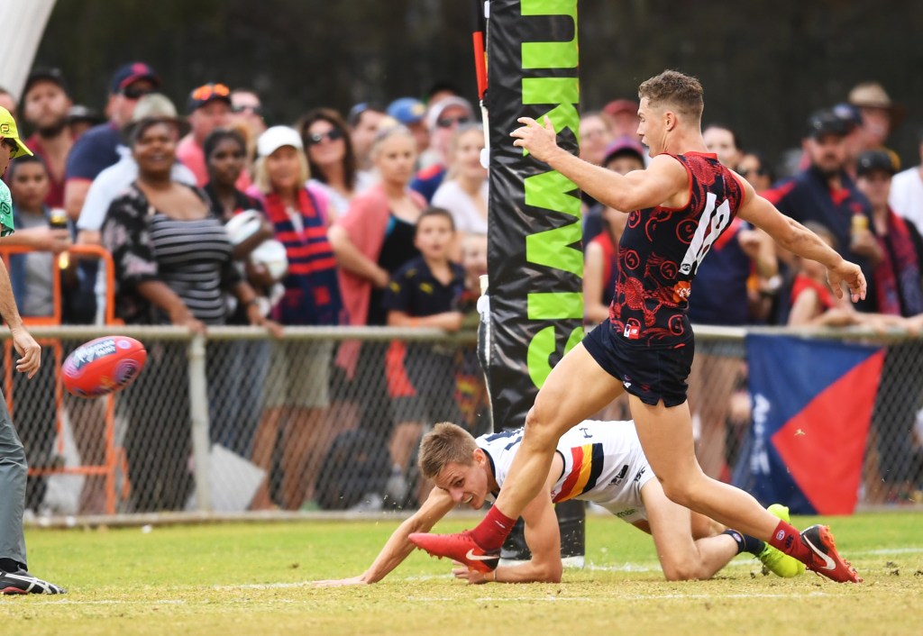 VINTAGE D-MAC: David Mackay attempts to 'levitate' the ball over the line using a powerful Mindfulness technique, only for Jake Melksham to soccer it over instead using an even more powerful technique known as 'Kicking'. Photo: Mark Brake / AAP